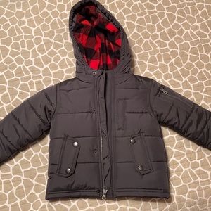 OshKosh black hooded puffer coat. Never worn.